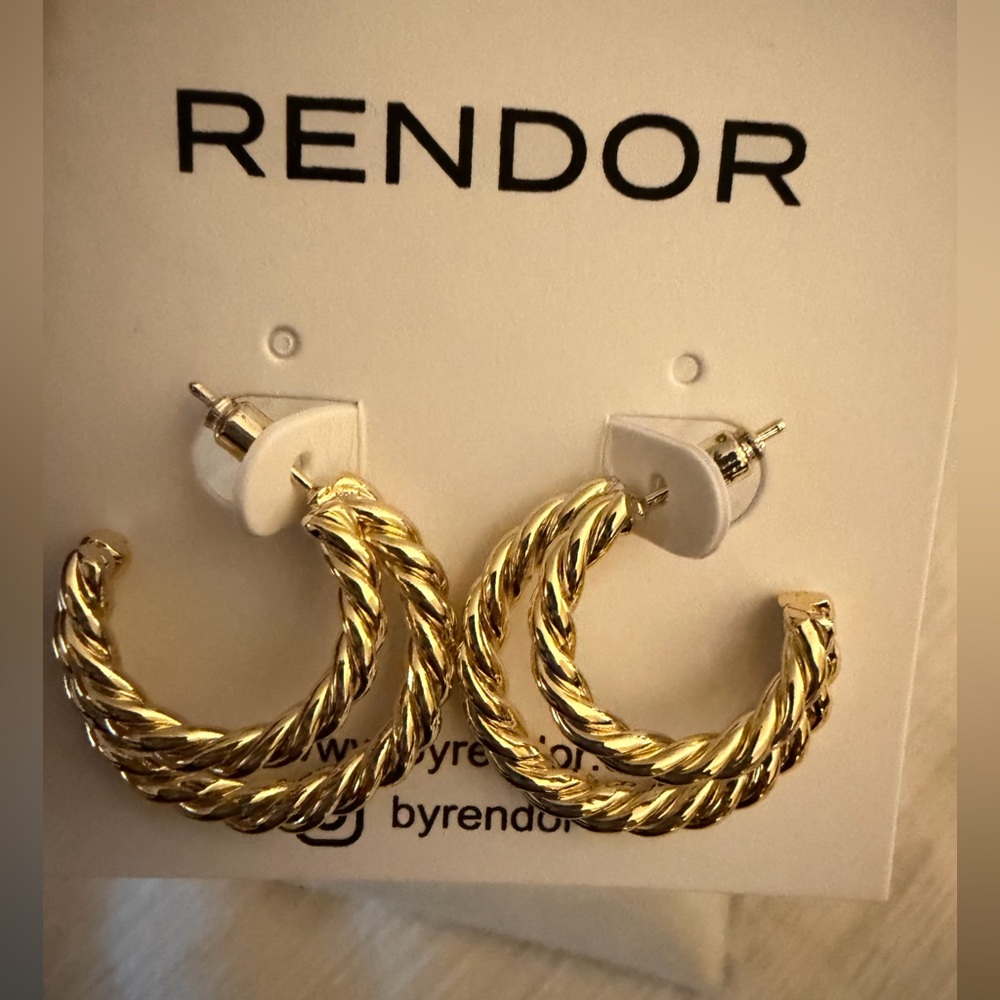 Beautiful gold double hoop earrings with rope design by Rendor.